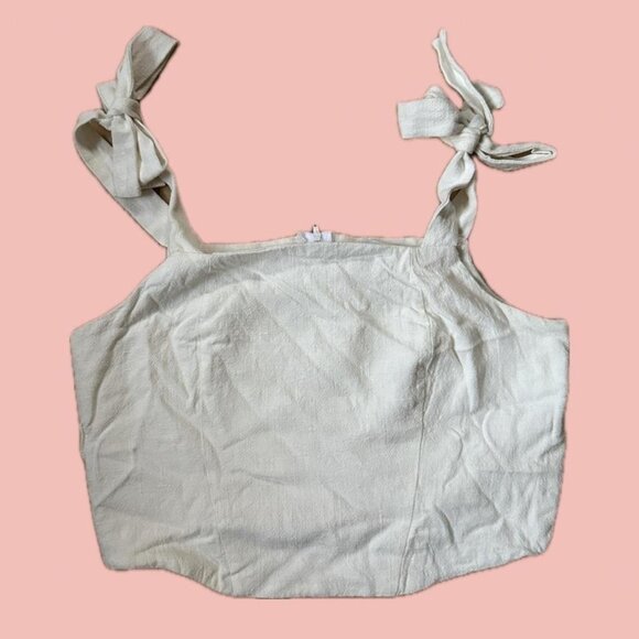 Minimalist off-white corset-style top with tie straps - Picture 1 of 7